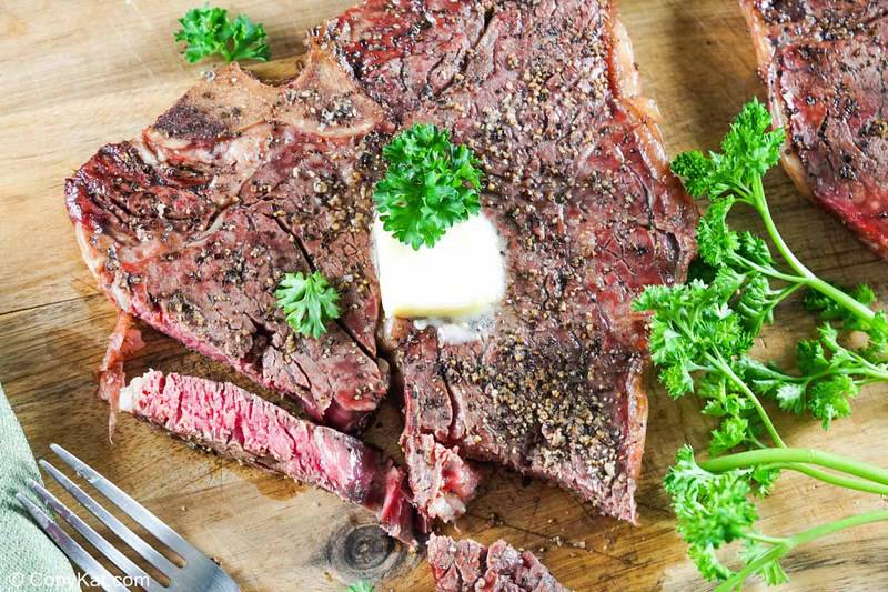 smoked steak, parsley, and a fork